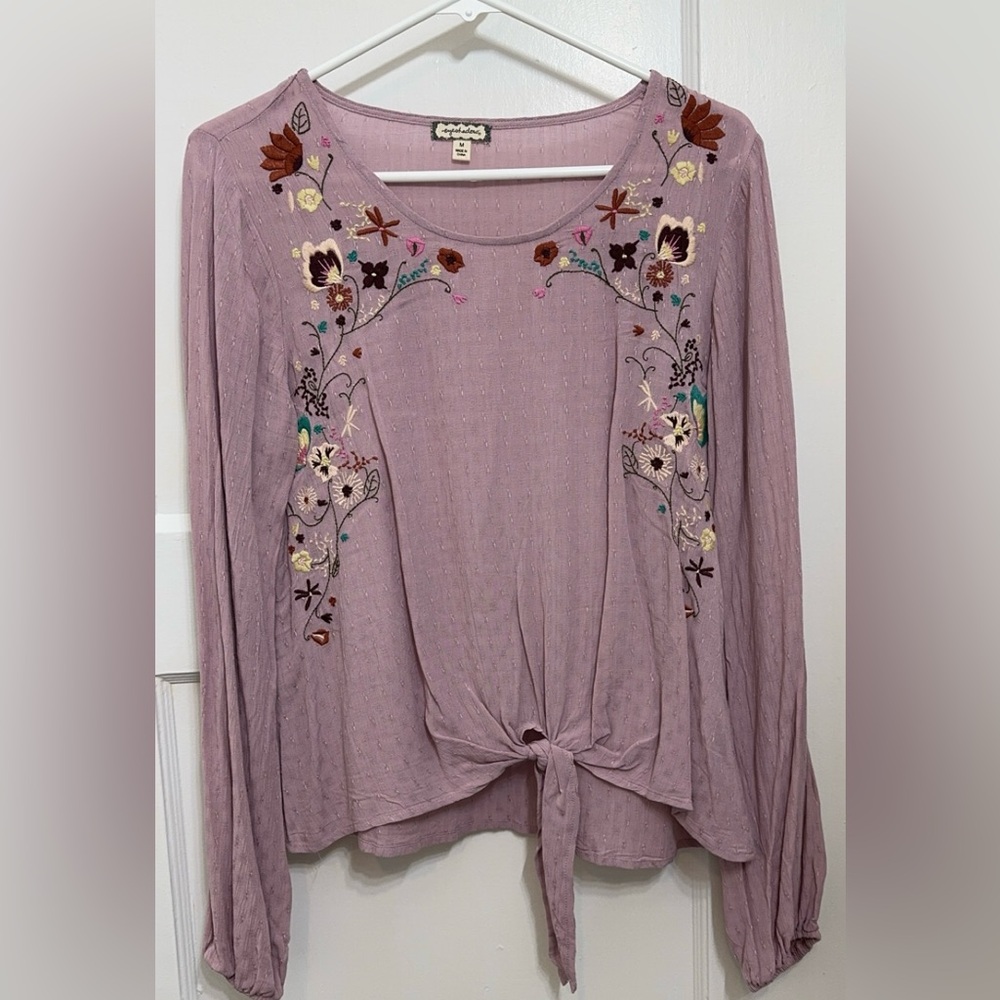 Eyeshadow brand pullover top. Mauve in color. Size Medium.